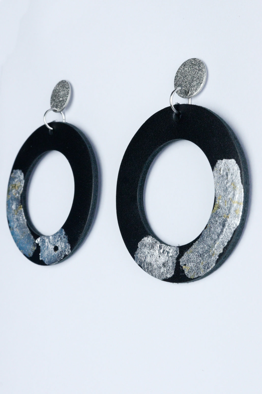Unique circle earrings with applied gold leaf