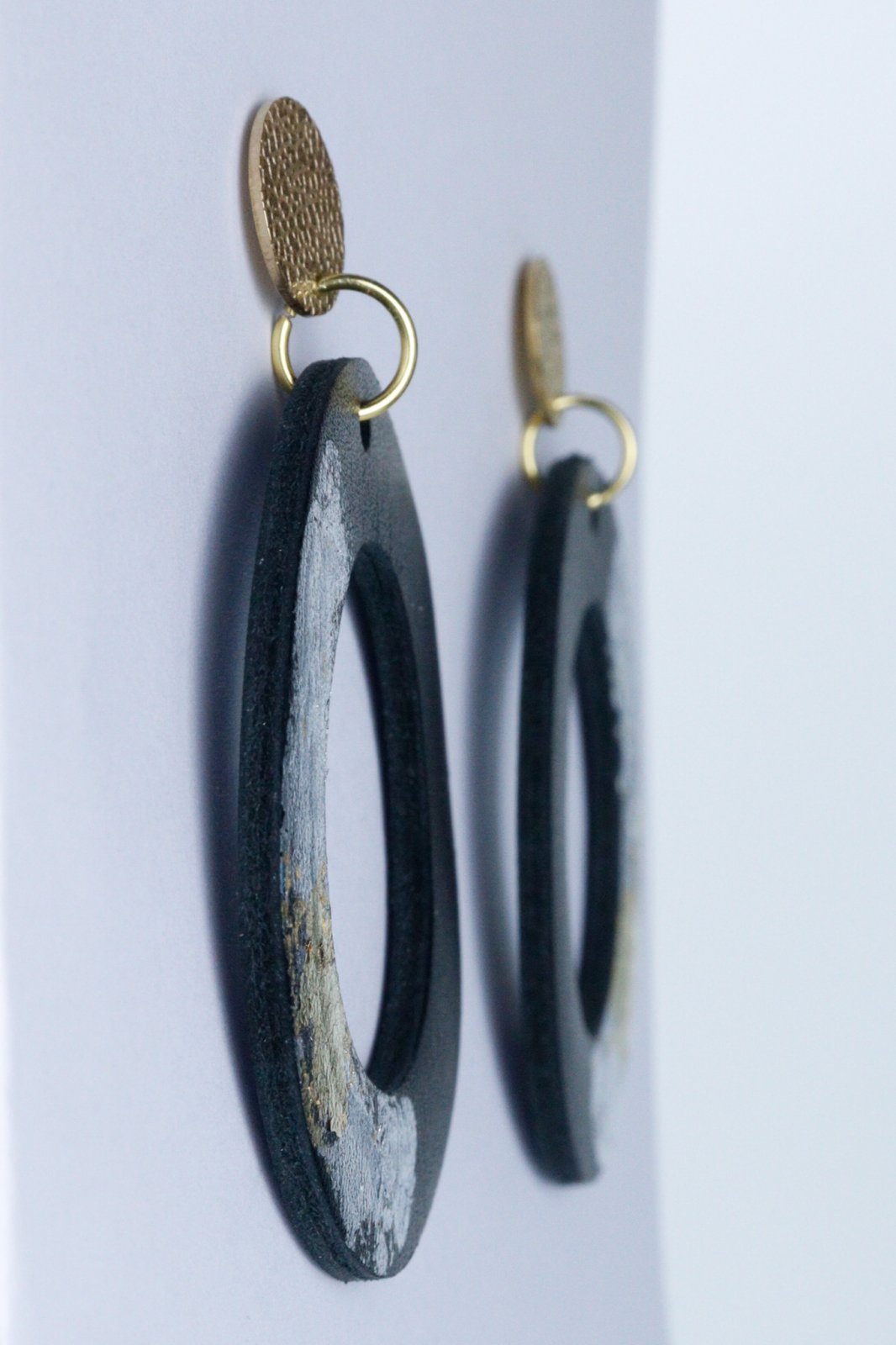 Unique circle earrings with applied gold leaf