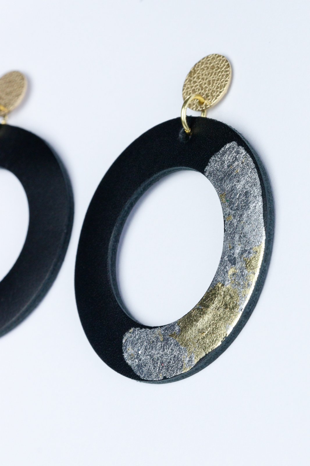 Unique circle earrings with applied gold leaf