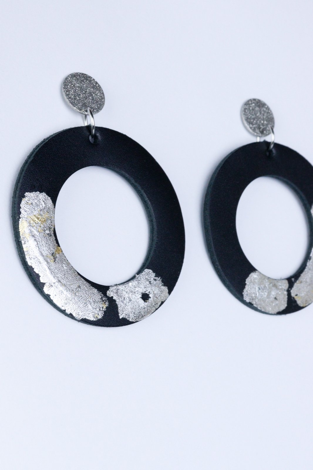 Unique circle earrings with applied gold leaf